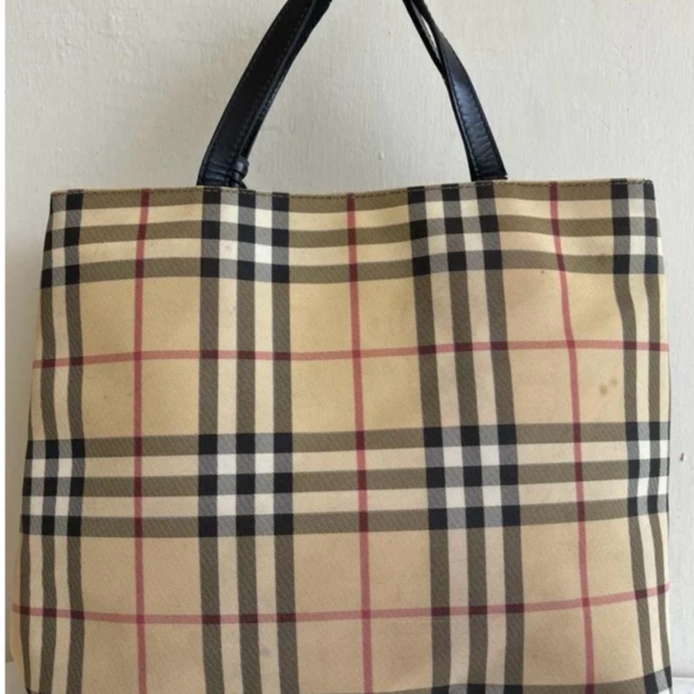 VINTAGE BURBERRY WITH SOLID METAL BURBERRY TAG.